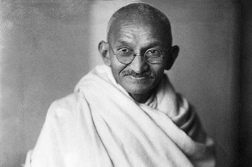 1024px-Mahatma-Gandhi,_studio,_1931 Elliott & Fry Public domain, via Wikimedia Commons.jpg