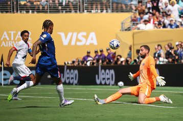 Joao Pedro #20 of Chelsea FC scores his team's third goal past Gianluigi Donnarumma #1 of Paris Saint-Germain during the FIFA Club World Cup 2025 Final match between Chelsea FC and Paris Saint-Germain at MetLife Stadium on July 13, 2025 in East Rutherford