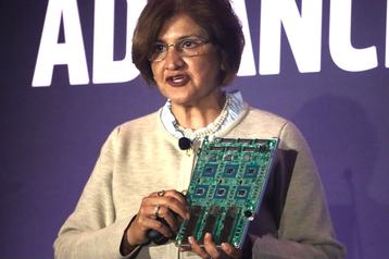 Soni Jiandani holding aloft the 'Vulcano' AI NIC