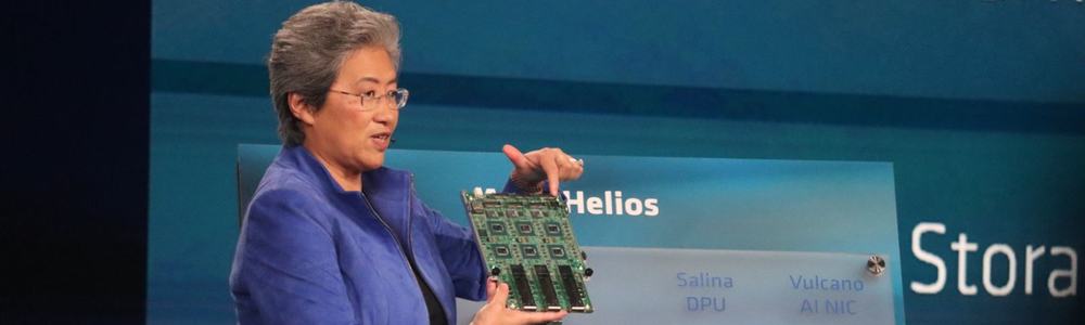 Dr Lisa Su holding up the 'Vulcano' AMD Pensando AI NIC at Advancing AI 2026