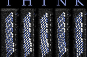 Subatomic particles lined up into bytes spelling IBM's famous motto - see below for further explanation