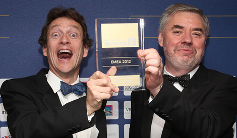 Guy Willner, (left) celebrates his award for business leader of the year