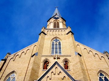 The Guardian Angels Catholic Church, built with characteristic yellow Chaska brick