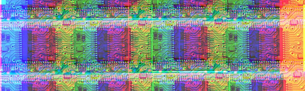 A repeating pattern of a photograph of a silicon chip, recoloured so that it is multi-coloured, in the style of pop art.