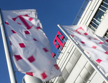 Company logo on the roof of a Deutsche Telekom building.