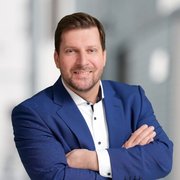 Dr. Christian Hüttl