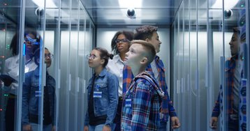 GettyImages-1082077558 children in a data center.jpg