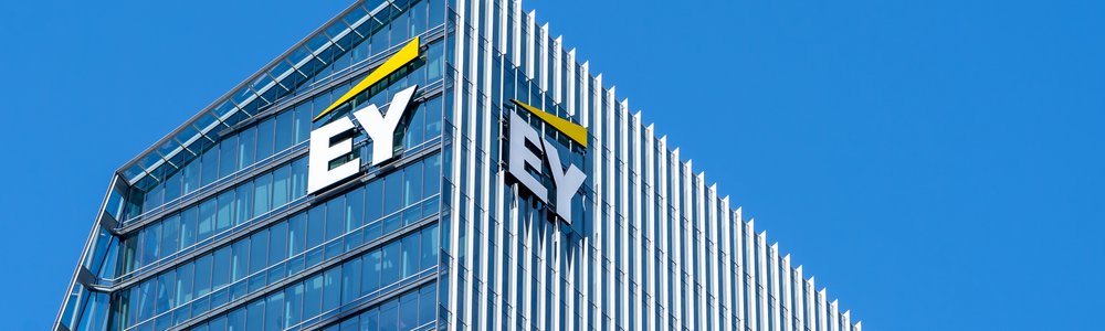 Sign and logo of EY on EY Tower in downtown Toronto