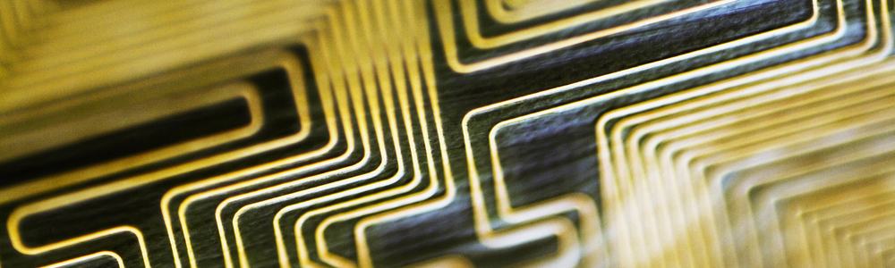 A close-up of a yellow and black circuit board