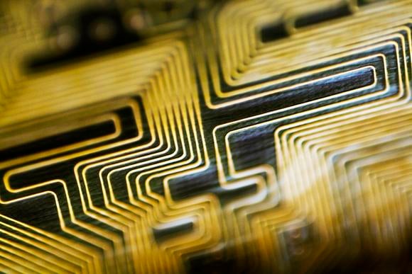 A close-up of a yellow and black circuit board