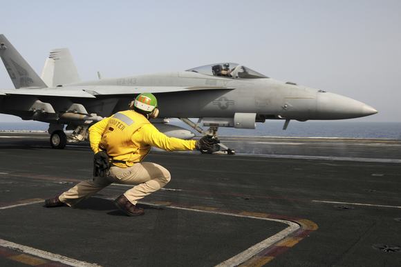 GettyImages- A shooter launches an F/A-18E Super Hornet from USS Dwight D Eisenhower