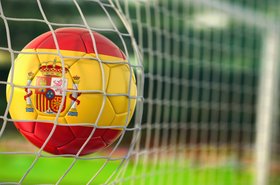 Football with Spanish flag superimposed; kicked into goal