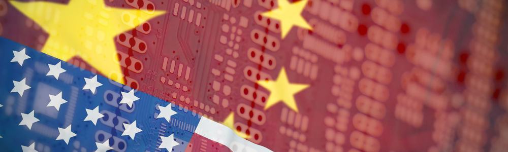 US and Chinese flags superimposed on a PCB board