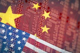 US and Chinese flags superimposed on a PCB board