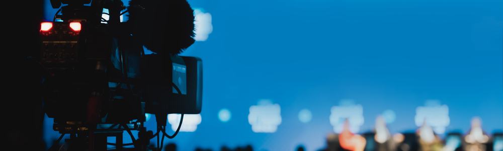 conference being broadcasted live on a news channel