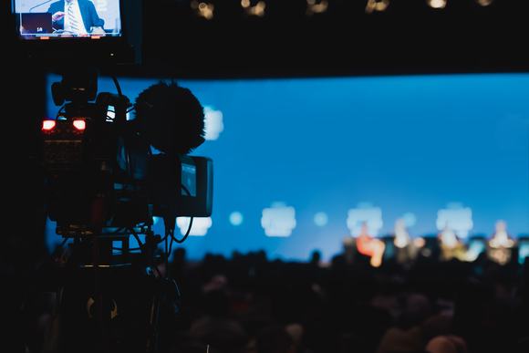 conference being broadcasted live on a news channel