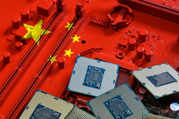 Republic of China flag on a red painted PC motherboard with some processors on it