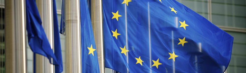 EU Flags Flying at the European Commission Building in Brussels, Belgium