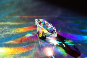 Diamond on shiny background