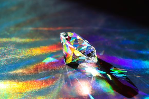 Diamond on shiny background