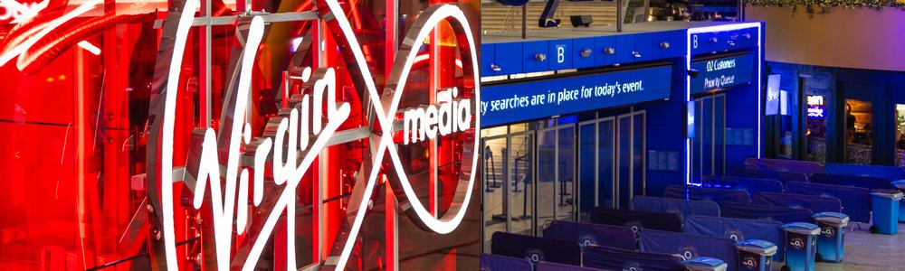 Virgin Media logo illuminated at the O2 Arena entrance