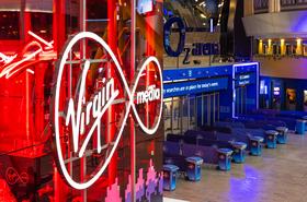 Virgin Media logo illuminated at the O2 Arena entrance
