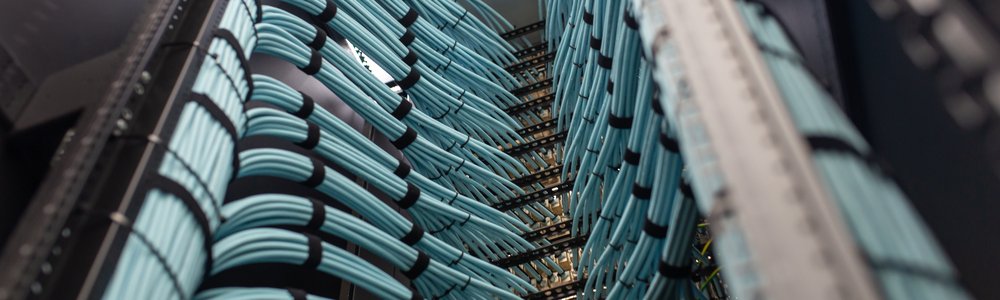 Organized Fiber Optic Cables in Network Rack