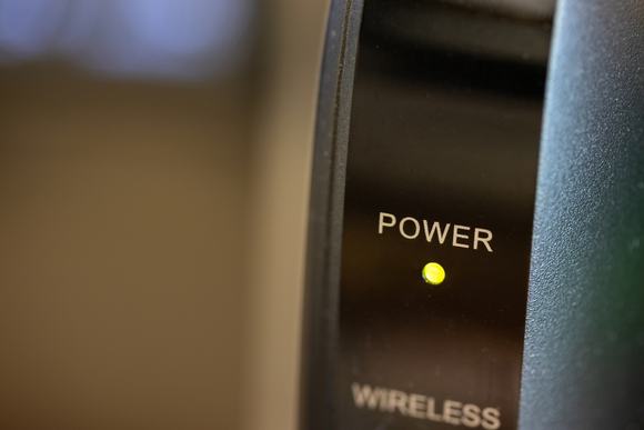 Yellow-green power light on Wi-Fi router
