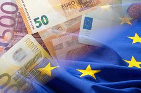 Flag of the European Union and euro banknotes
