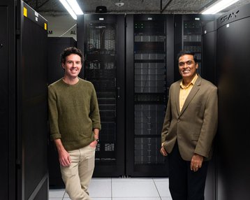 Giri Prakash, director of the data center for DOE’s Atmospheric Radiation Measurement (ARM) user facility, and Ryan Prout, HPC data analytics engineer, NCCS, with ARM’s Cumulus-2 system at ORNL.jpg
