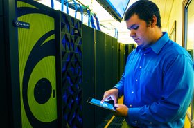 Marist College student, Zachary Meath, demonstrates the SDN invention that allows quick management of network communications resources via a phone or tablet