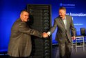 Tom Rosamilia, senior VP of IBM's Systems and Technology Group (left) and Doug Balog, IBM General Manager of Power Systems (right) in front of a rack filled with the new Power8 servers