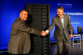 Tom Rosamilia, senior VP of IBM's Systems and Technology Group (left) and Doug Balog, IBM General Manager of Power Systems (right) in front of a rack filled with the new Power8 servers