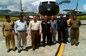 India Border Security Force staff members in front of an agency aircraft. Image source: Wikimedia Commons.