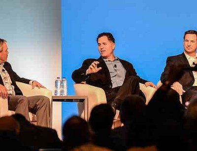 Dell CEO Michael Dell (middle) sitting on a panel at Dell World 2012