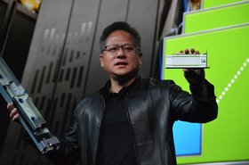 Nvidia CEO Jensen Huang holds a T4