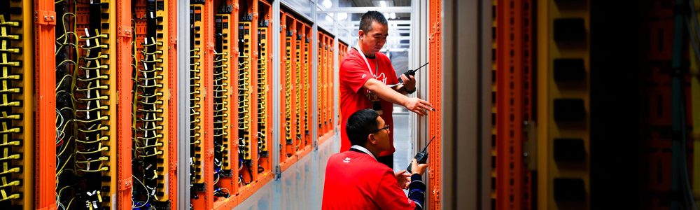 Alibaba Cloud engineers working in one of its data centers