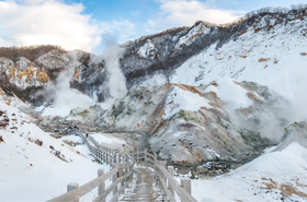 Panorama-views-with-wooden-walkway-bridge-of-the-Hell-valley-Hokkaido-Japan-1024x630.jpg