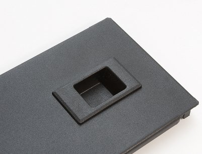 Snap latch on one end of a Polargy PolarSnap blanking panel