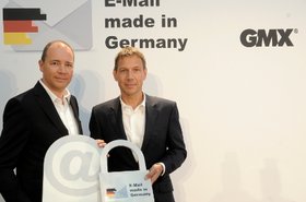 Ralph Dommermuth, CEO of United Internet (left), and  Deutsche Telekom CEO Ren├® Obermann