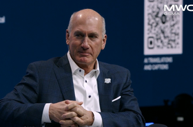 AT&T CEO John Stankey speaking at MWC 2026
