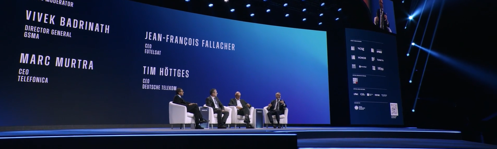 The CEOs of Eutelsat, Deutsche Telekom, and Telefónica on stage at MWC 2026