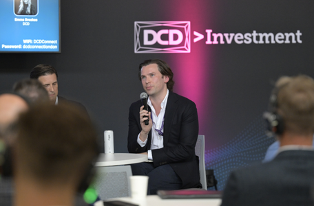 DCD Investment Speaker on stage