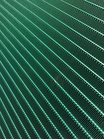 Stulz Epoxy resin spray coating of a microchannel heat exchanger small.png