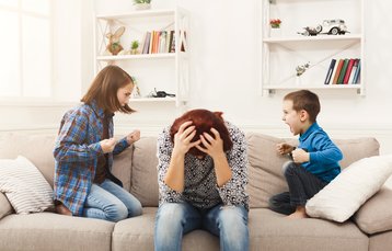 Kids squabbling, despairing mum