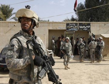 US Army private first class Chris Craighead at an election site in Iraq in 2009. Image courtesy of the US Army.