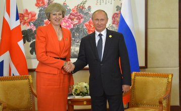 Prime Minister Theresa May with Russia's Vladimir Putin