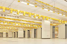 Empty racks on the brand-new raised floor at Washington StateÔÇÖs new data center in Olympia