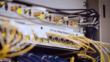 The White Rabbit switch, a key component of the CERN-born open-source timing technology.