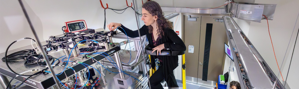 UChicago researchers Leah Weiss and Grant Smith work in the lab of Prof. David Awschalom